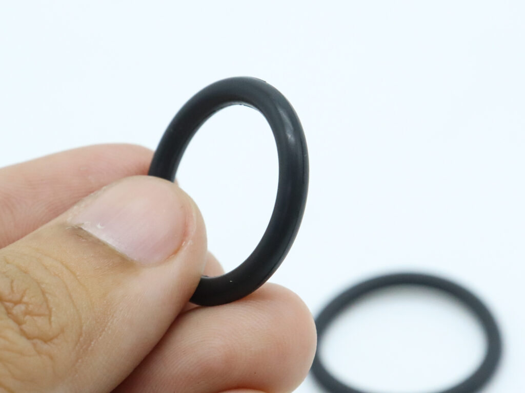 hand holding o-ring close up